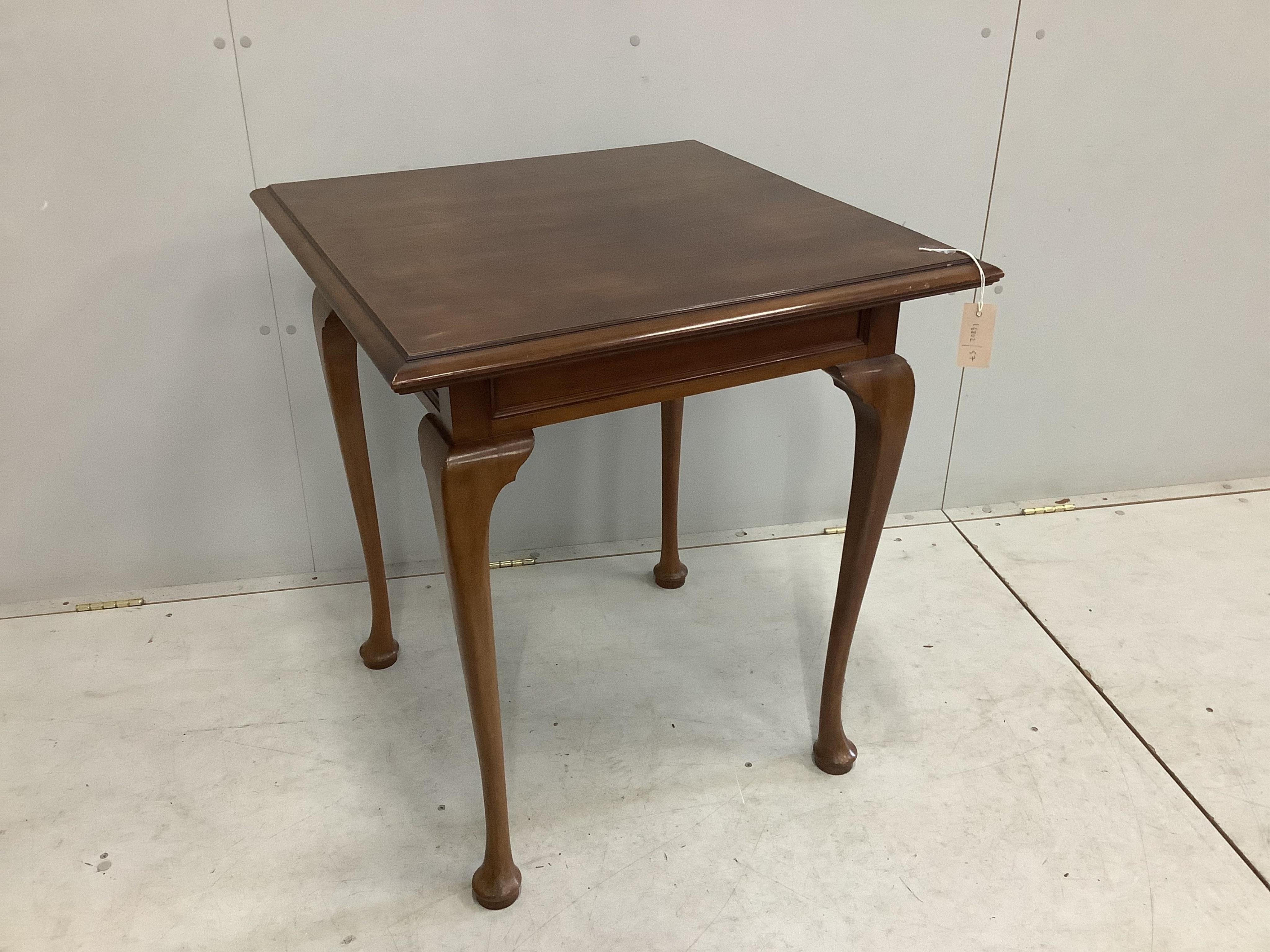 An early 20th century square mahogany occasional table, width 68cm, height 76cm. Condition - fair